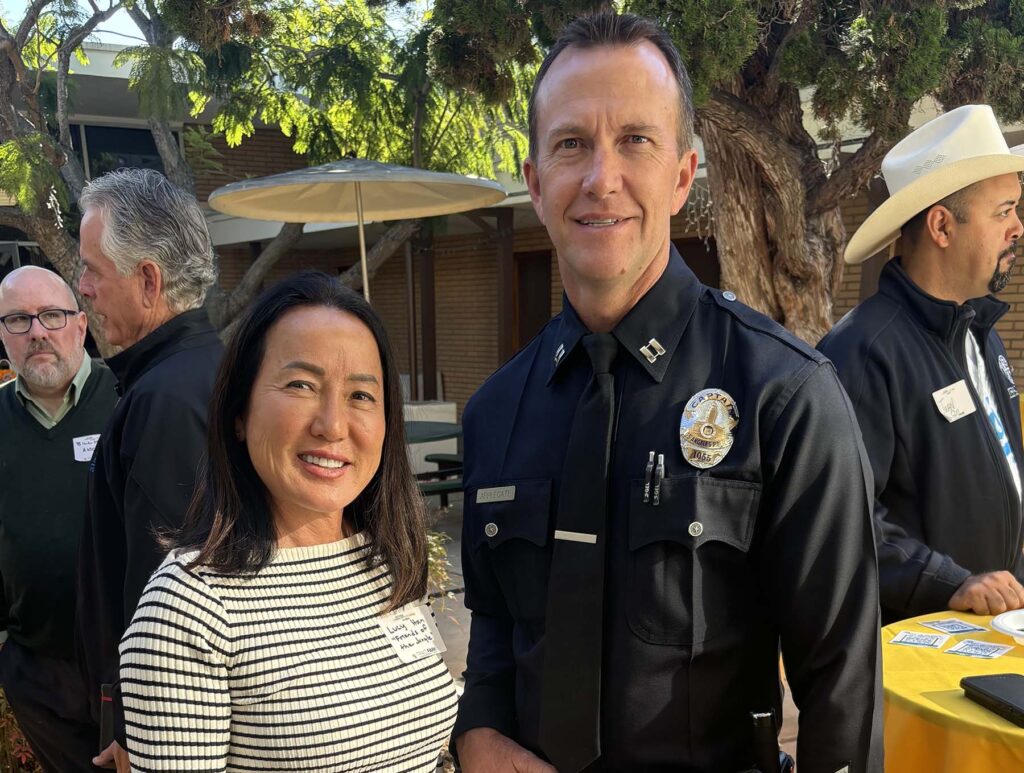 Lucy Han with Offier